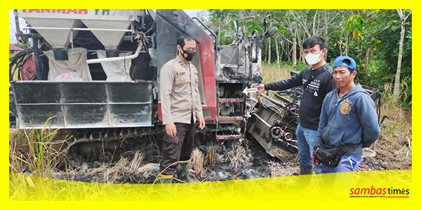 Polsek Tekarang meninjau TKP Combine terbakar diarea sawah petani, Minggu (22/1/2023).