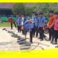 Petugas Polsek Paloh, Polres Sambas melakukan Penertiban 24 Knalpot Recing di SMAN 1 Paloh, Kecamatan Paloh, Kabupaten Sambas, Kamis (22/10/2026).
 